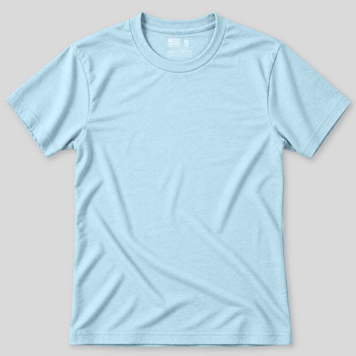 A light blue short-sleeve crewneck t-shirt laid flat against a neutral light gray background.