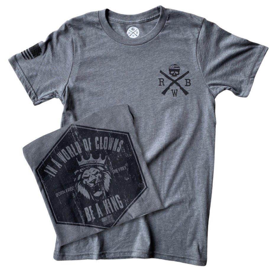 Men's American Made T-Shirt  in Heather Gray
Front Design:  RWB Logo
Back Design: In a world of clowns be a king
Right Sleeve:  American Flag